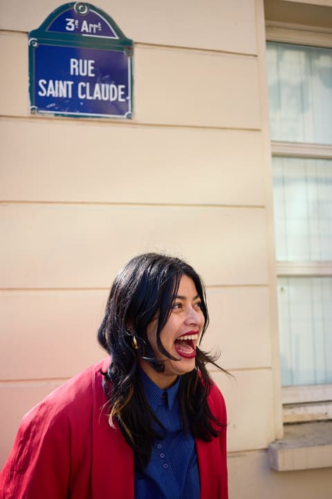 Mishar Briones laughing on Rue Saint Claude, Paris
